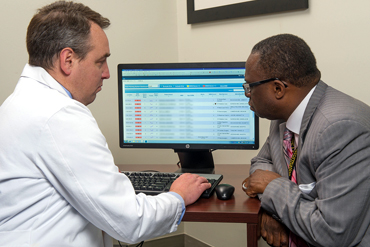 Colin Banas, M.D., M.S.H.A., and Reuben Southall Jr., M.S., CPHIMS