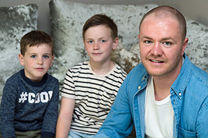 Adam Ball with his two sons