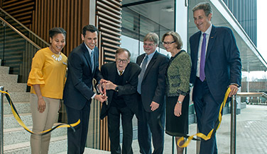 University leaders cut the ribbon on the College of Health Professions' new building.